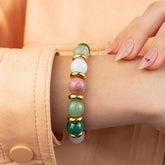Handcrafted bracelet promoting love and harmony with colorful natural stones.